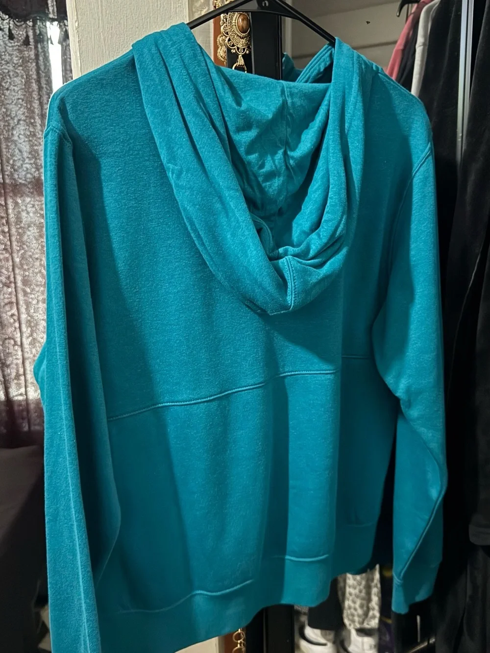 Nike women’s Teal Zip-Up Hoodie with Purple Front Panel and Yellow Logo